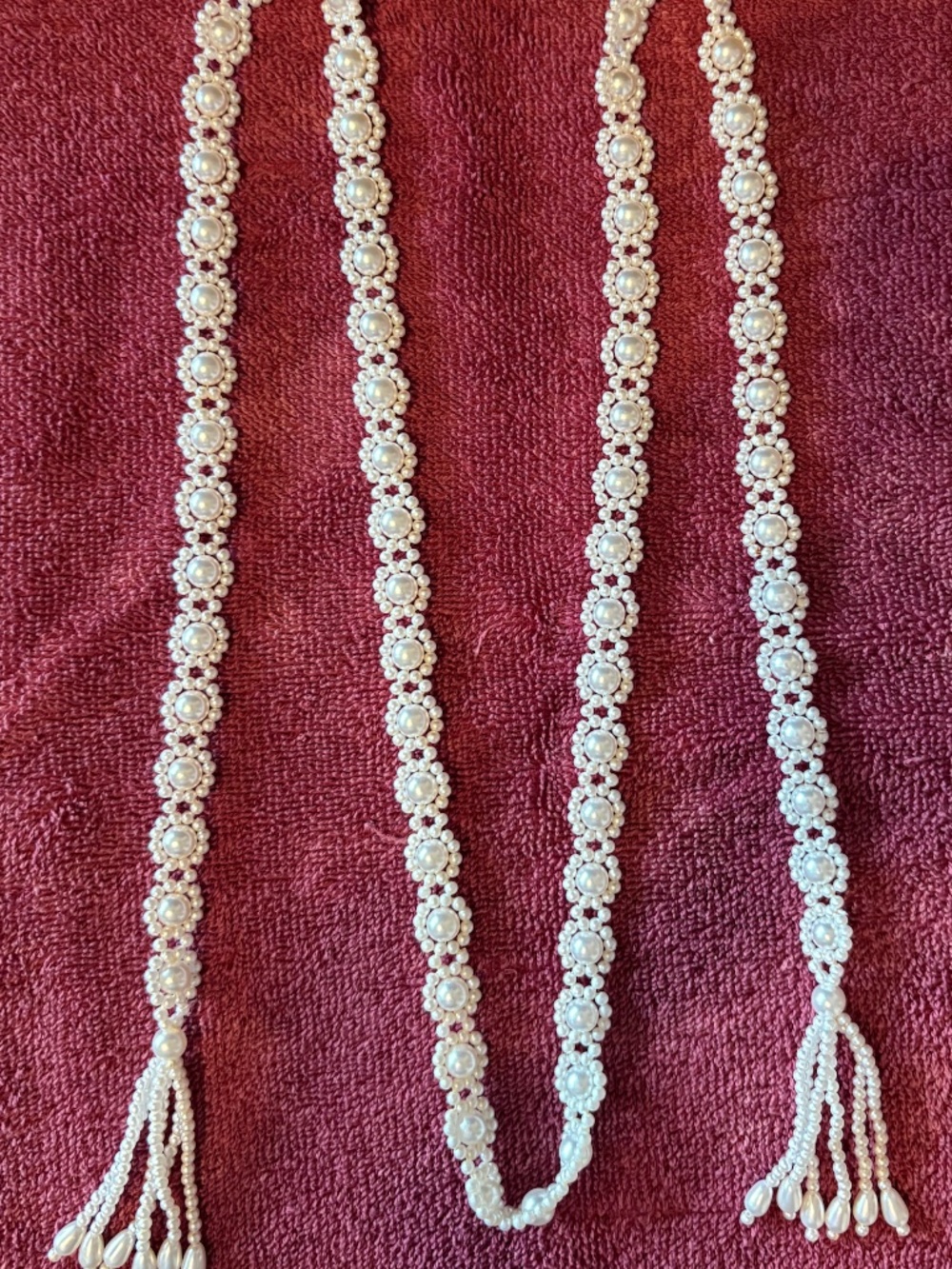 Pearl (costume) flower necklace (48" length)